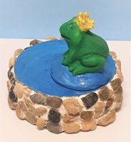Froschkönig im Brunnen