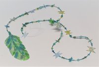 Dekokette mit Raysinfeder (grün-blau)