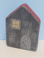 Haus (Raysin), schwarz-grau mit rotem Dach